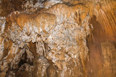 Stalactites in a cave, Thailand clipart