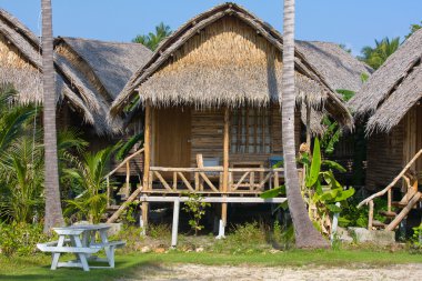 Tropical house on the beach clipart