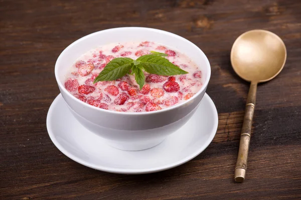 Strawberry in yogurt — Stock Photo, Image