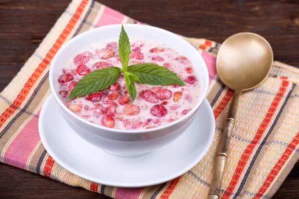 Strawberry in yogurt — Stock Photo, Image