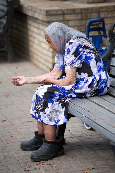 Beggar woman. Kiev, Ukraine.