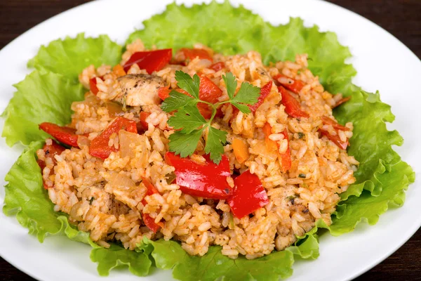 Rice with vegetables and chicken in a curry sauce — Stock Photo, Image