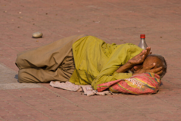 Homeless man in Haridwar, India.