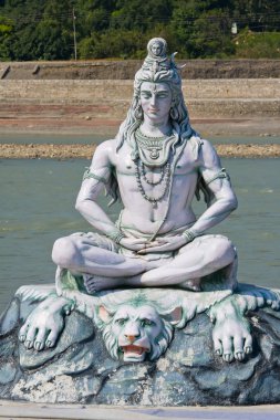 Shiva statue in Rishikesh, India clipart