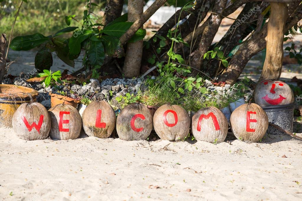 Welcome painted on coconuts