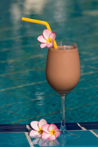 Chocolate shake at the swimming pool — Stock Photo, Image