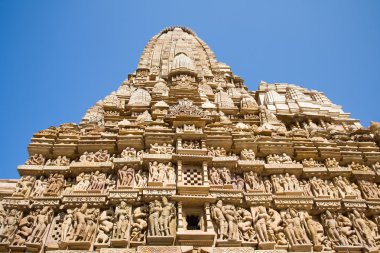 Erotic Temple in Khajuraho. Madhya Pradesh, India. clipart