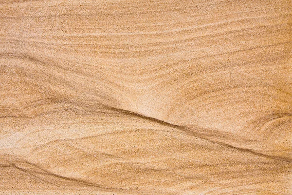 Närbild av en sandsten tegel - en strukturerad bakgrund — Stockfoto