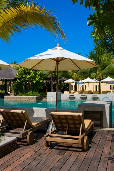 Tropical beach chair next to the pool in Thailand — Stock Photo, Image