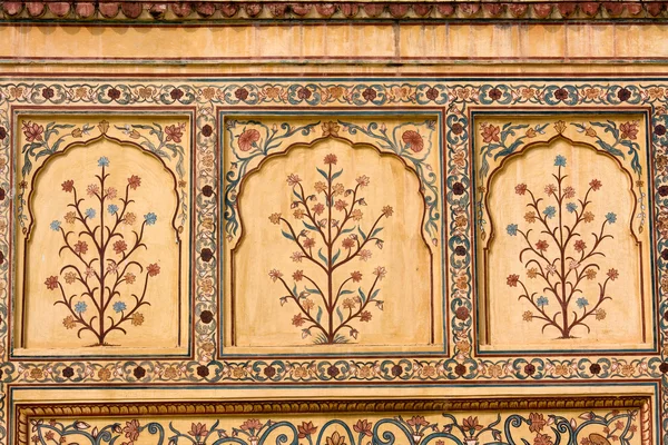 Indyjski ornament na ścianie pałacu w fort jaipur Indie — Zdjęcie stockowe