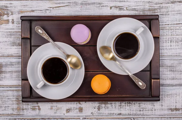 Two Cups Coffee Spoon Macaron Cakes Tray White Wooden Table — Stock Photo, Image