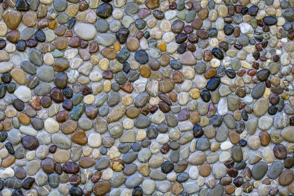 Çakıl taşı duvar dokusu arkaplan ya da doku, kapat. Ön cephe dekorasyonu yapılıyor