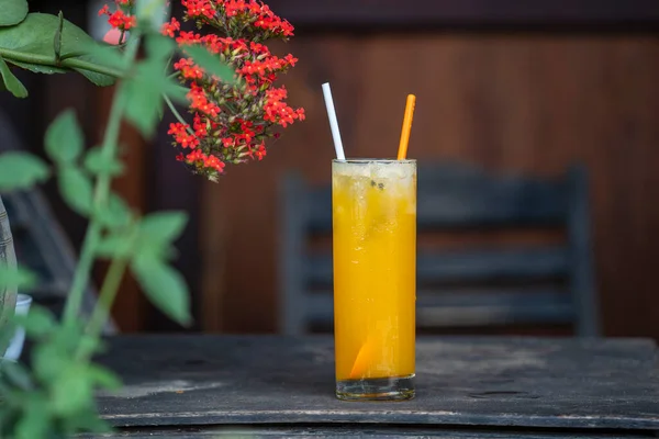 Glass Tropical Juice Mango Orange Wooden Table Street Cafe Close — стоковое фото