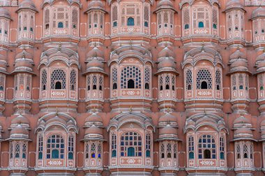 Hawa Mahal duvar manzarası, eski şehir Jaipur 'da pembe rüzgar sarayı, Rajasthan, Hindistan. Hint mimarisinin arka planı, yakın plan.