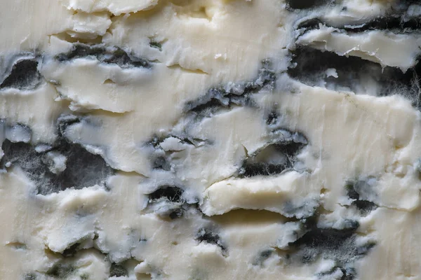 Mavi peynir arkaplanı ve desen kesikte, üst görünümde, kapat, makro