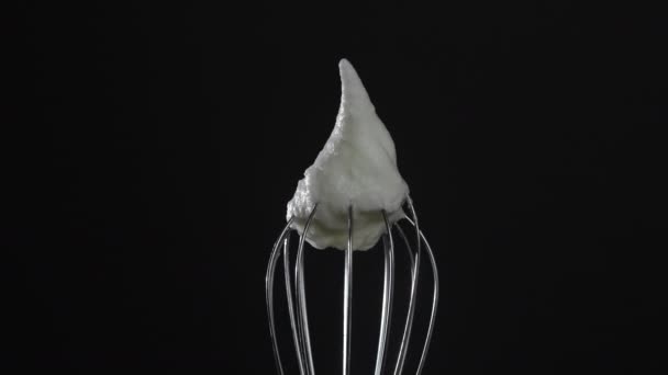 Metal Whisk Whipped Egg Whites Isolated Black Background Close Rotates — Stock Video