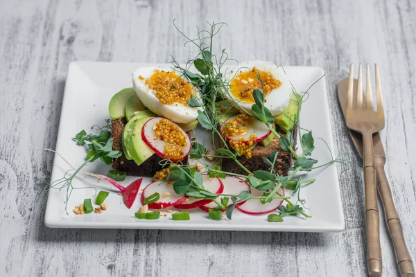Bread Toast Boiled Eggs Avocado Slice Pea Microgreens Fresh Radish — Stockfoto
