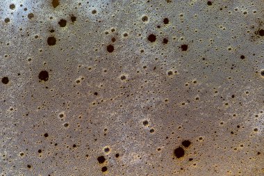 Bira köpüğünün arka planı, üst görüş, yakın çekim, makro. Bira köpüğü dokusu