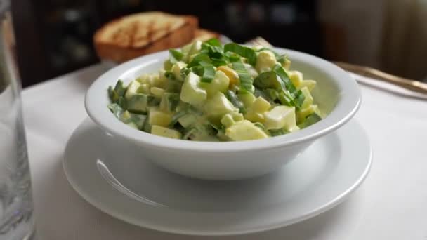 White Plate Salad Wild Garlic Cucumber Boiled Egg Sour Cream — Stock Video