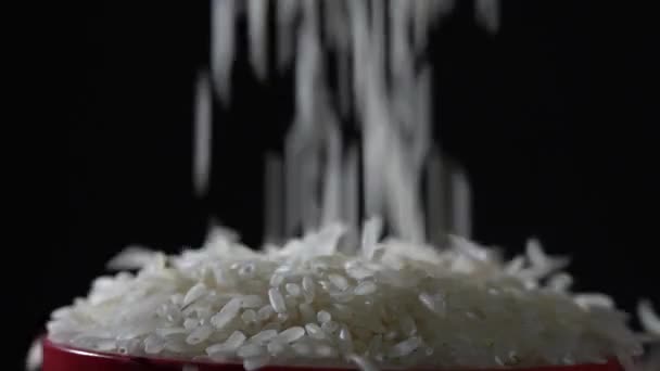 White Rice Falls Fills Bowl Table Close Shooting Black Background — Video