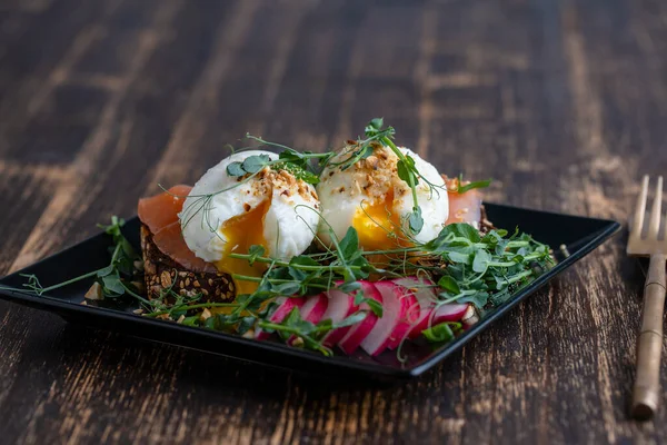 Bread Toast Poached Eggs Salmon Pea Microgreens Fresh Vegetables Plate — Stock fotografie