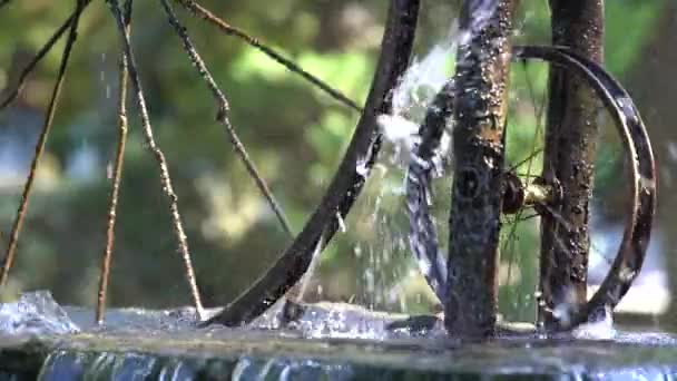 Beautiful Fountain Spinning Bicycle Wheel Sunlight Water Splashing City Batumi — Stockvideo