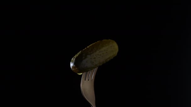 Pickled Cucumber Fork Rotates Black Background Close — Stock Video