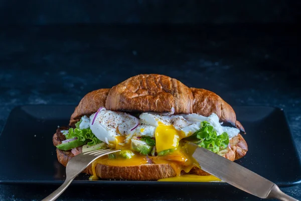 Croissant Fresh Sandwich Poached Egg Salmon Avocado Plate Black Background — 图库照片