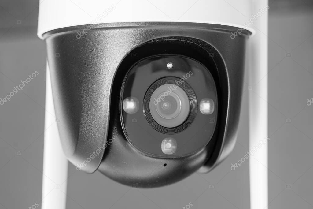 Close-up home security camera 360 on background. CCTV security camera. Technologies for monitoring and protection of territory