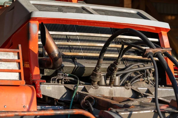 Front end and radiator of an old bulldozer, close up