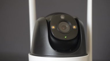Close-up home security camera 360 on background. CCTV security camera. Technologies for monitoring and protection of territory