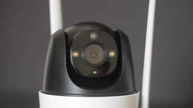 Close-up home security camera 360 on background. CCTV security camera. Technologies for monitoring and protection of territory