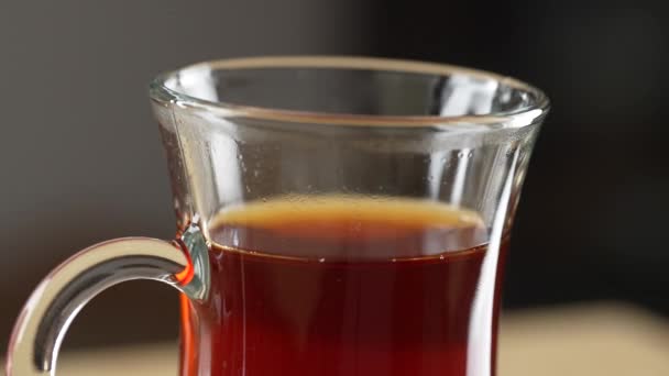 Adding White Milk Glass Cup Black Tea Close Rotation Slow — Stock Video