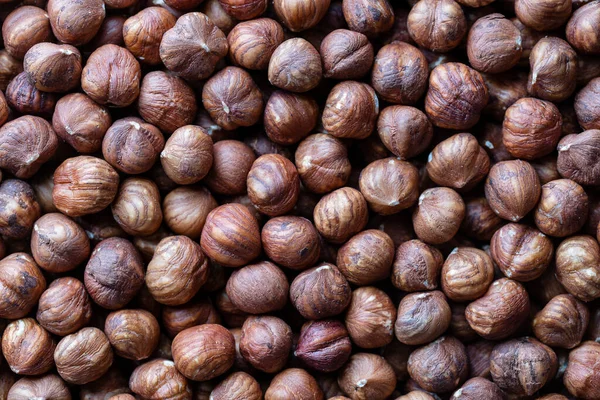 Dry Hazelnuts Background Heap Peeled Hazelnuts Kernels Top View Close — Zdjęcie stockowe