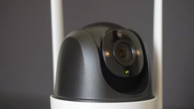 Close-up home security camera 360 on background. CCTV security camera. Technologies for monitoring and protection of territory