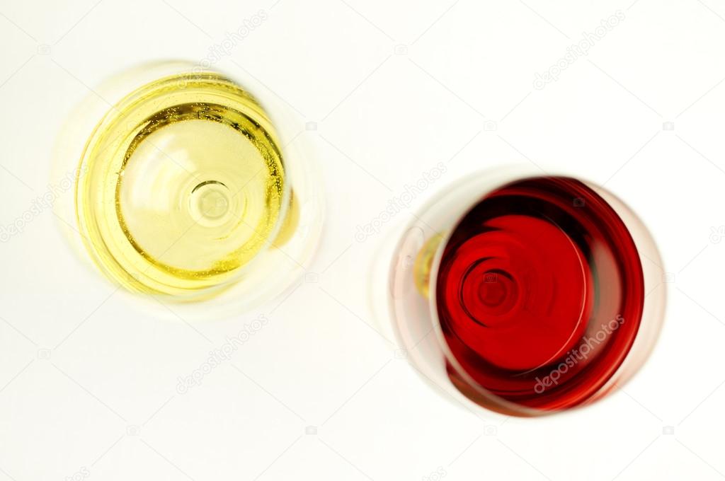 Glasses of red and white wines from above.