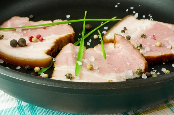 Bacon in the frying pan — Stock Photo, Image