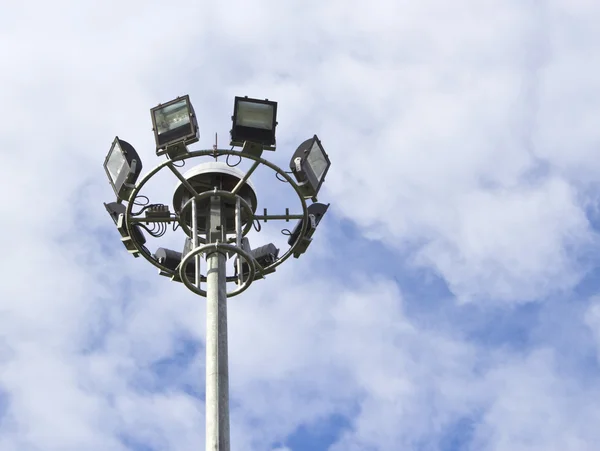 Spot-light tower in blue sky — Stock Photo, Image