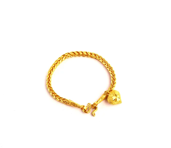 Pulsera de oro con forma de corazón la imagen aislada — Foto de Stock