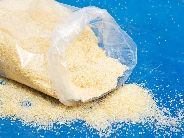 Zucchero di canna in sacchetto di plastica — Foto Stock