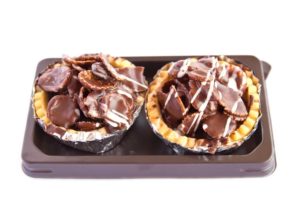 Set of tasty tartlets with chocolate — Stock Photo, Image