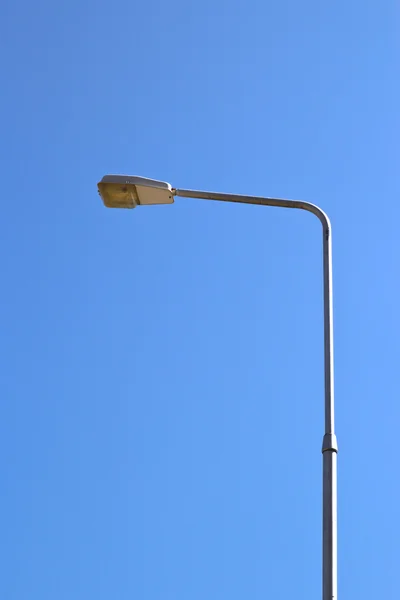 Streetlight isolated on blue sky — Stock Photo, Image