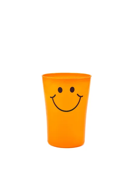 Copo de plástico laranja sobre fundo branco — Fotografia de Stock
