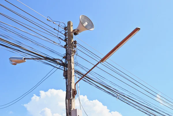 Electricity post in blue sky — Stock Photo, Image