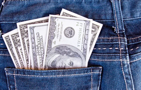 Notas de dólar americano no bolso jeans — Fotografia de Stock