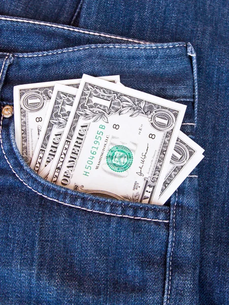 Dólares no bolso das calças de ganga traseiras — Fotografia de Stock