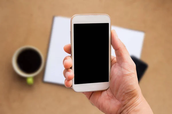 Mão Está Segurando Smartphone Com Tela Mockup Branco Acima Fundo — Fotografia de Stock