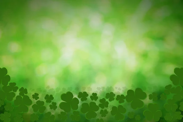 Stパトリックの日の背景緑のクローバーの葉ボケライトあなたのデザインのためのお祝いのデザインの背景 — ストック写真