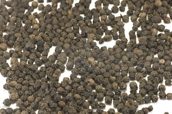 Peppercorns perto — Fotografia de Stock