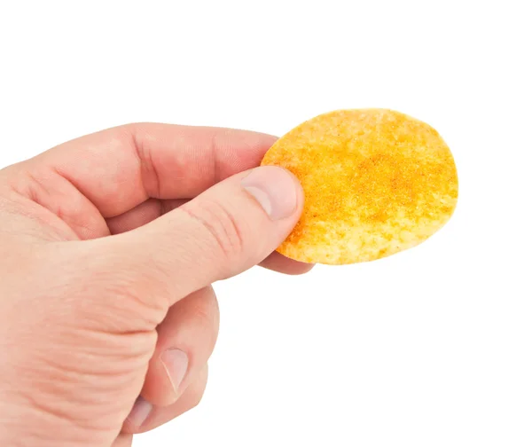Картофельные чипсы в руке — стоковое фото